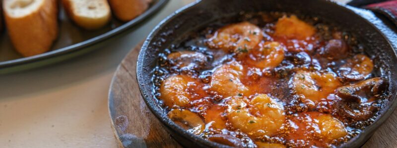 a pan of food sitting on top of a table